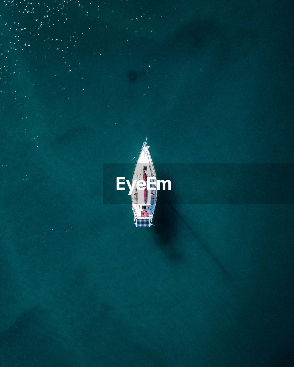 Aerial view of sailboat in sea