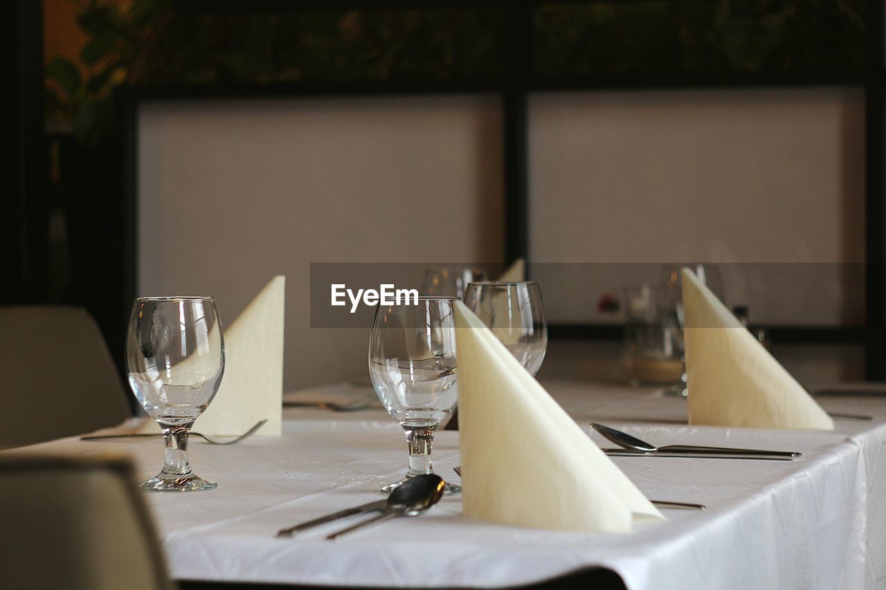 Place setting on table in restaurant
