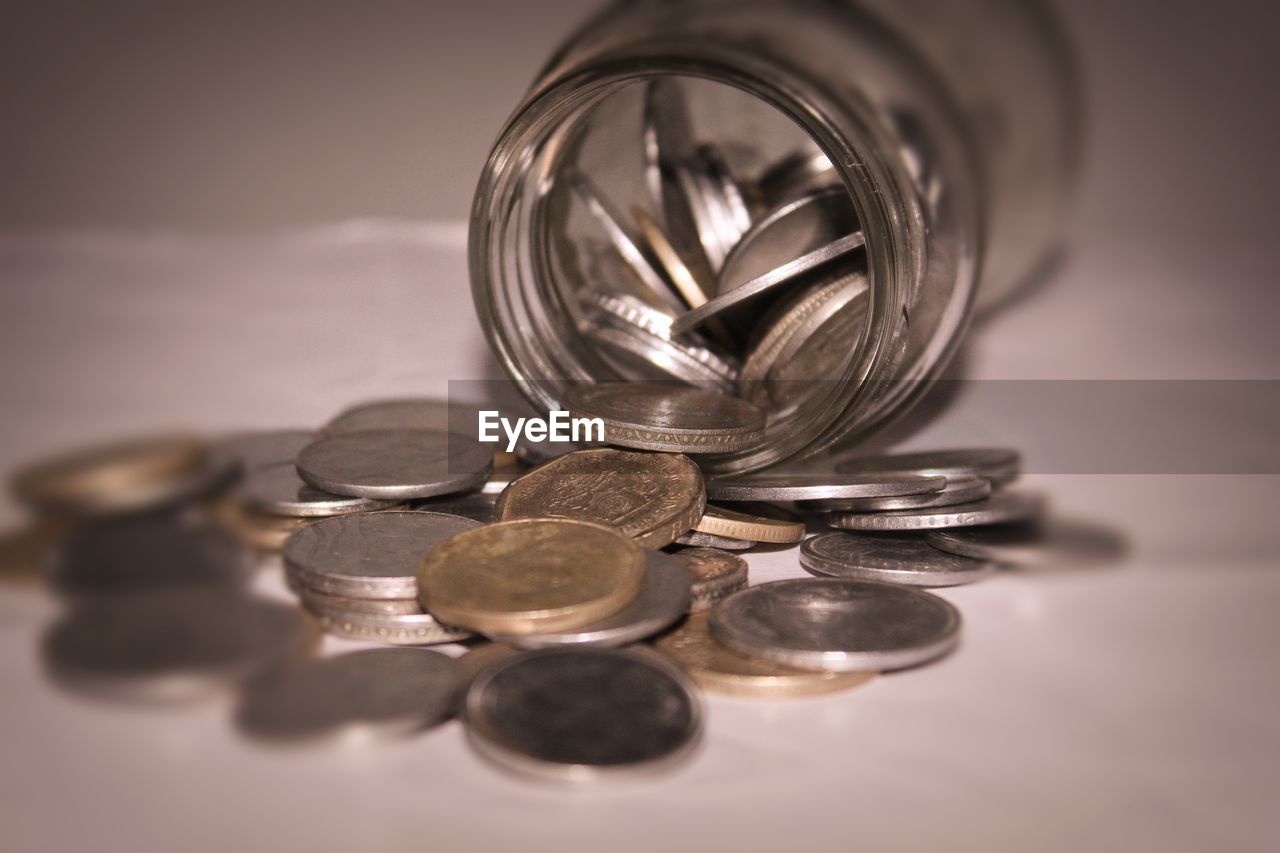 Close-up of coins on table