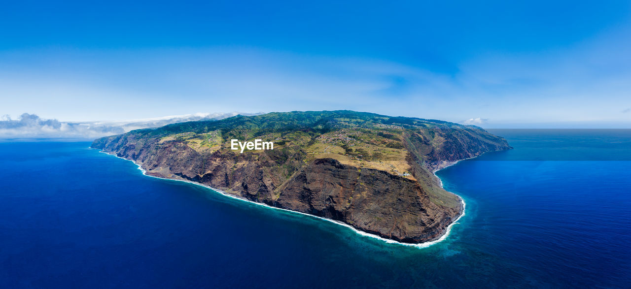 Drone panoramic view of madeira island from ponta do pargo lighthouse.