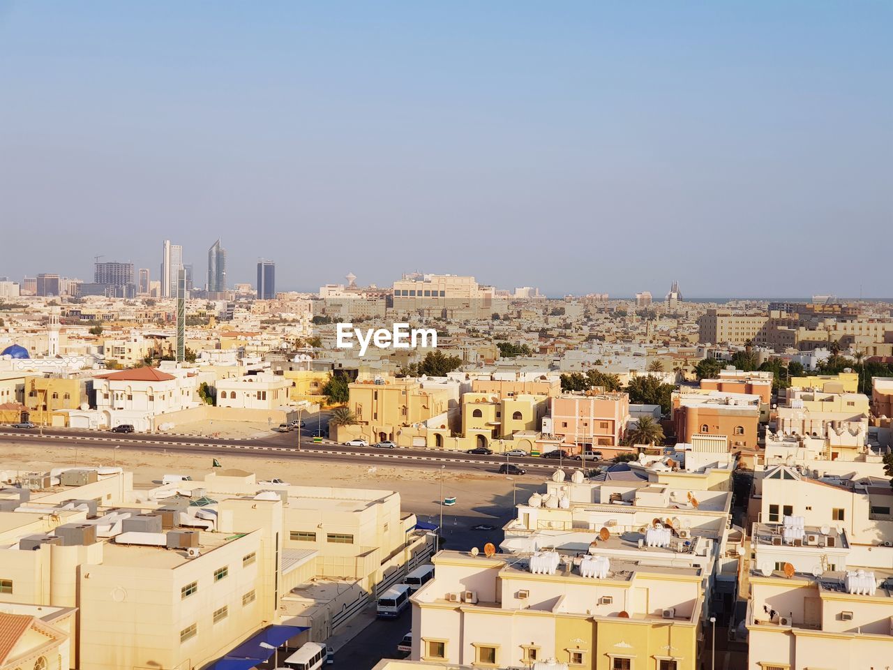 High angle view of townscape against clear blue sky