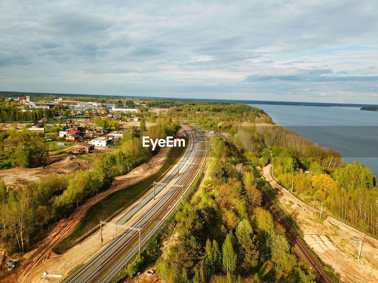 High angle view of road by sea against sky