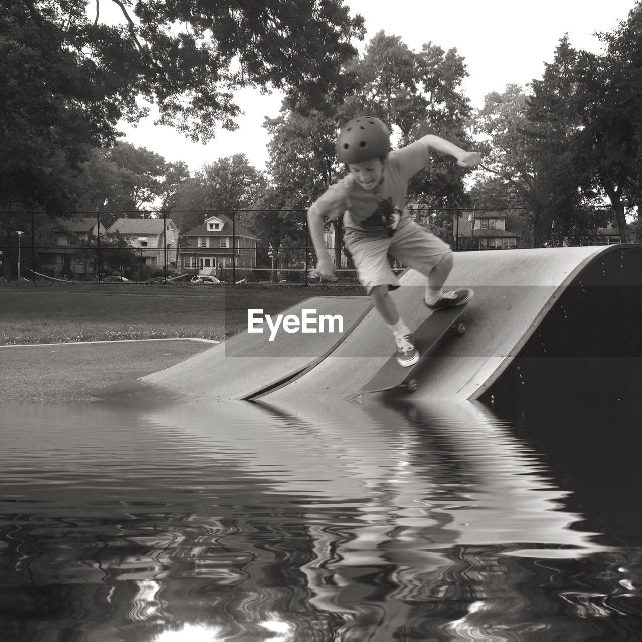 GIRL PLAYING IN WATER