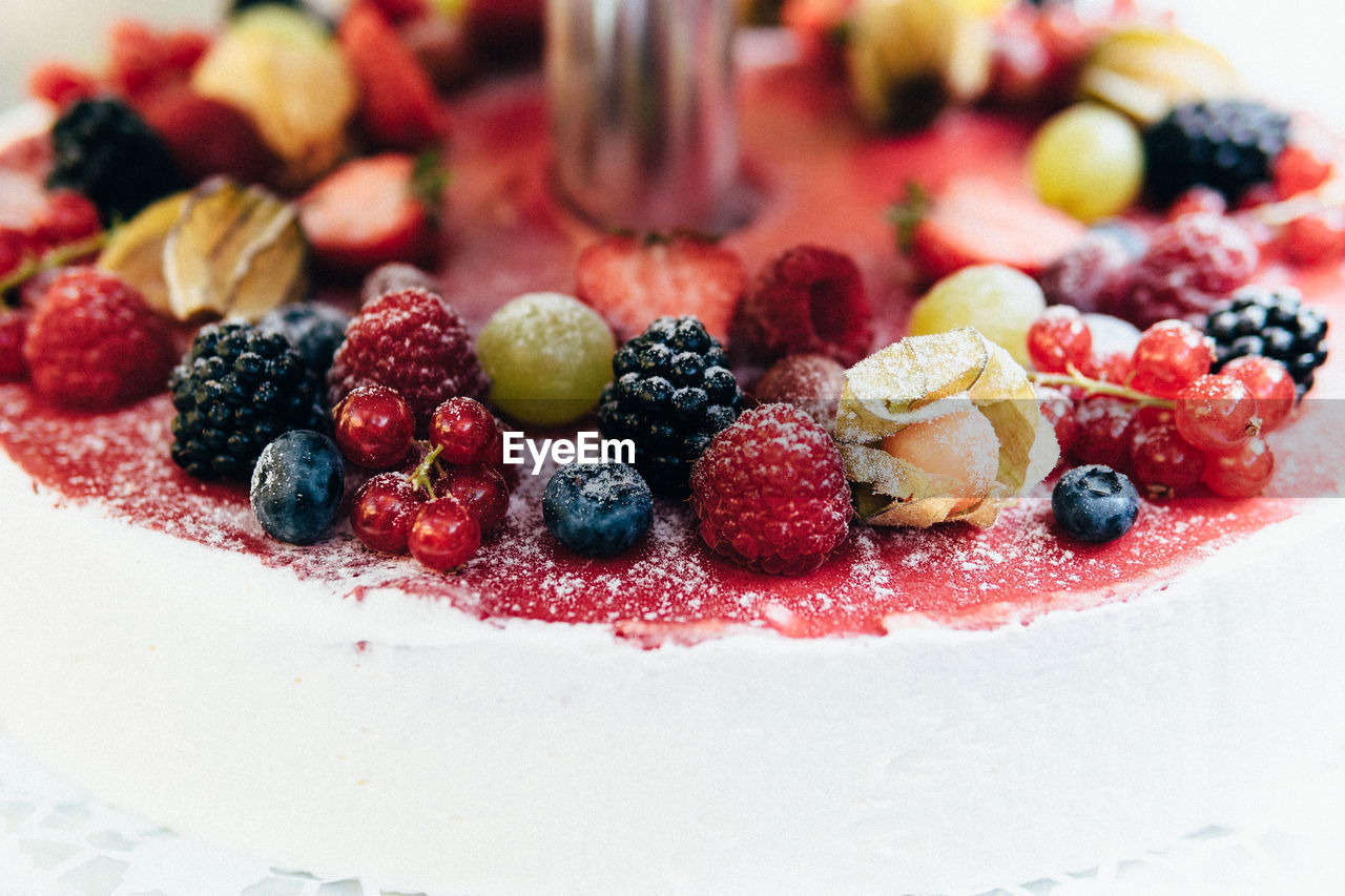 Close-up of berries on wedding cake