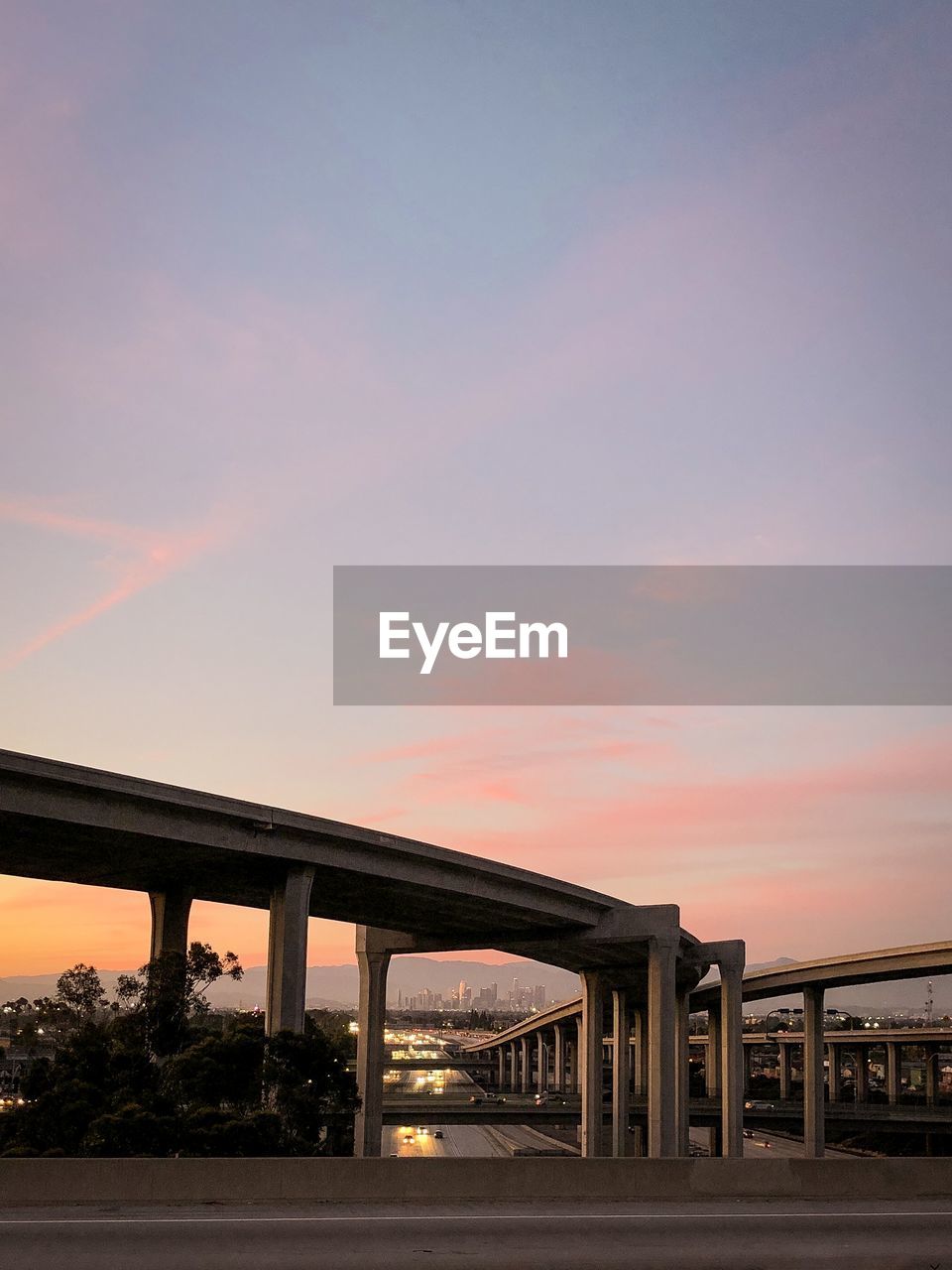 Bridge against sky during sunset