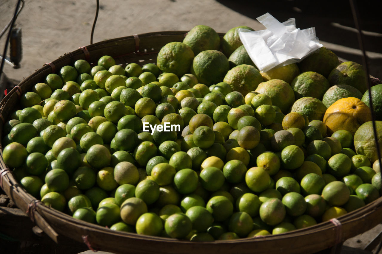 HIGH ANGLE VIEW OF FRUITS IN CONTAINER