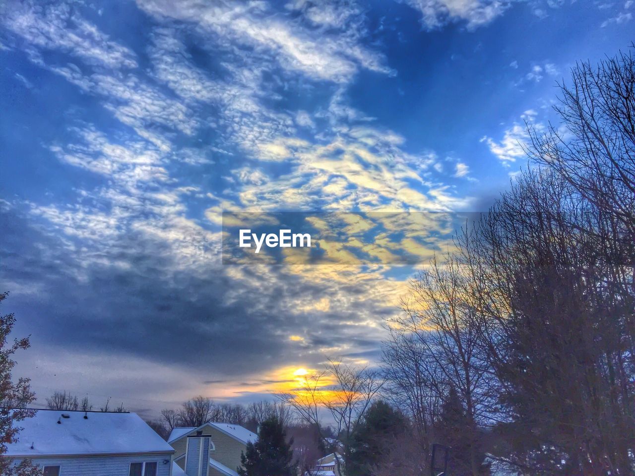 Sunset over town in winter