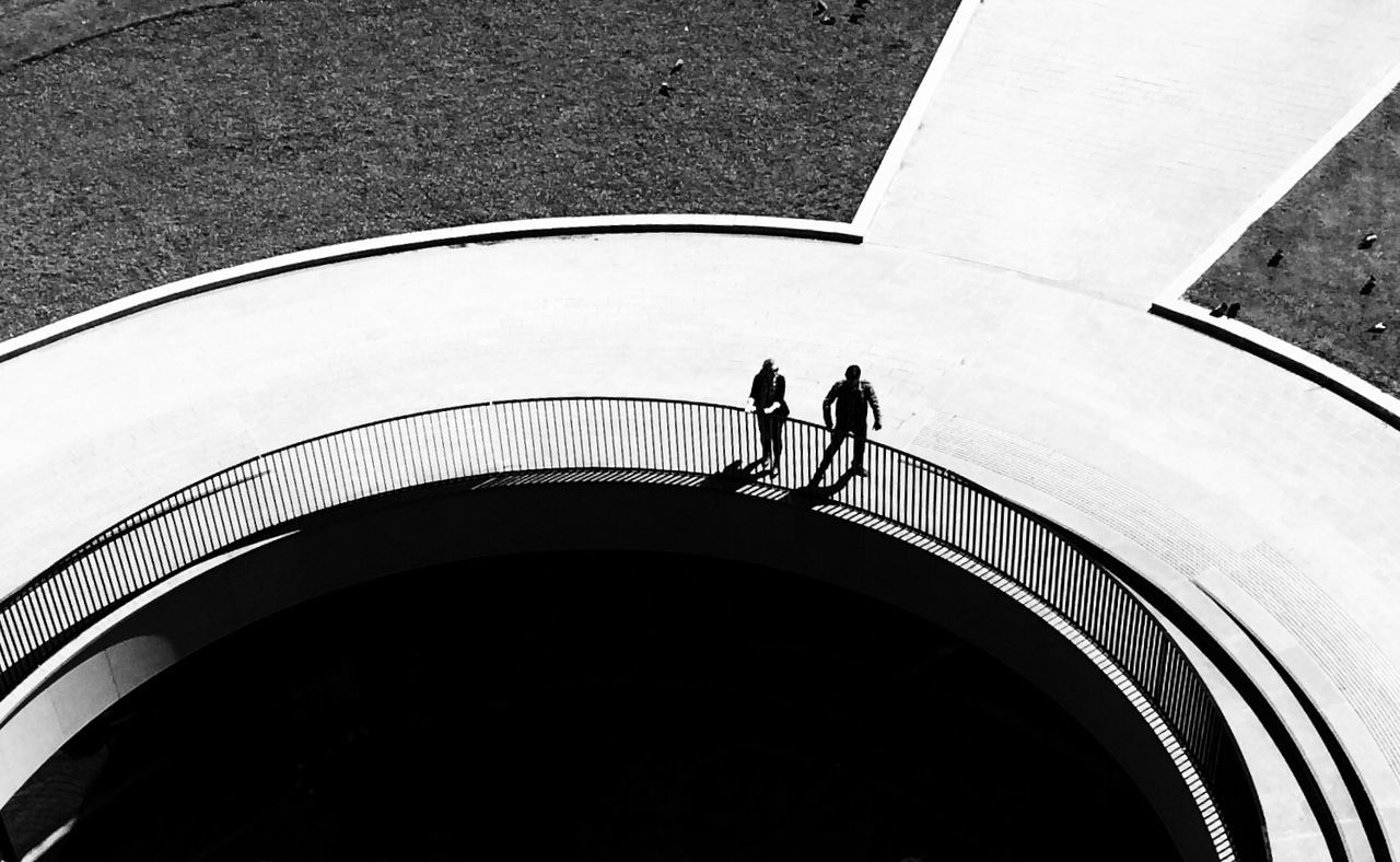 High angle view of people walking on pathway