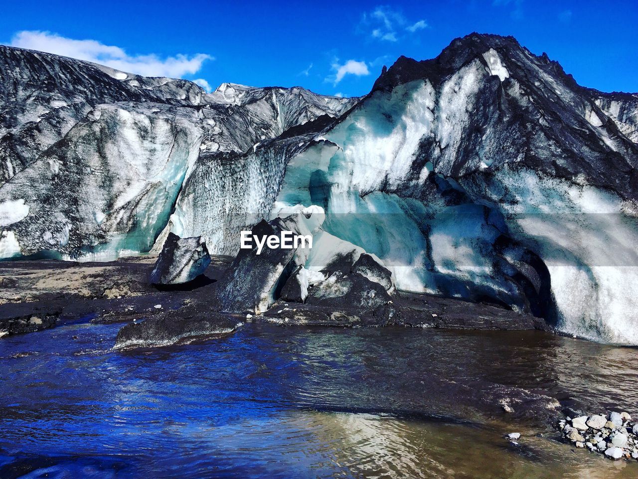 Scenic view of frozen lake against sky