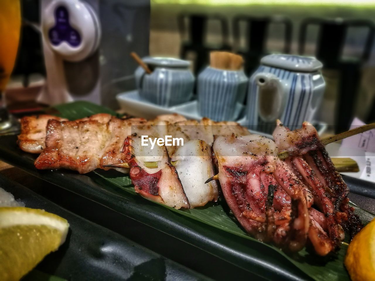 CLOSE-UP OF SEAFOOD ON BARBECUE