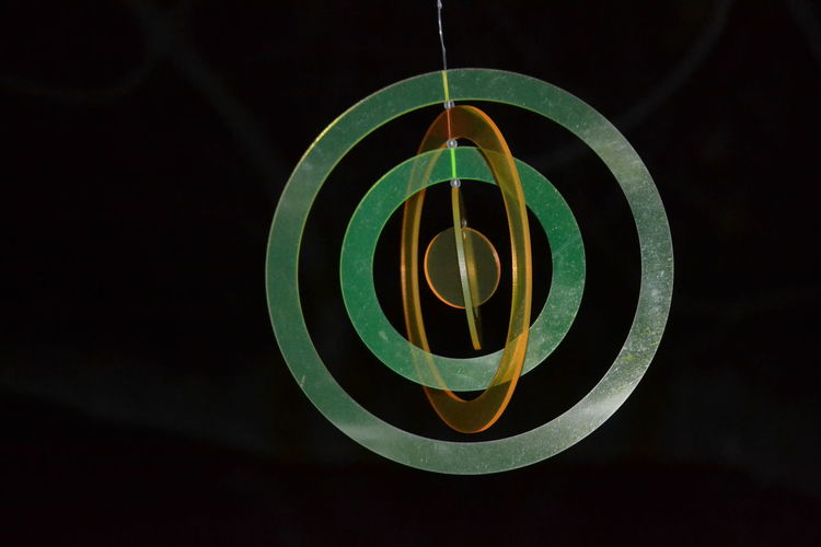 Close-up of illuminated plastic rings 
