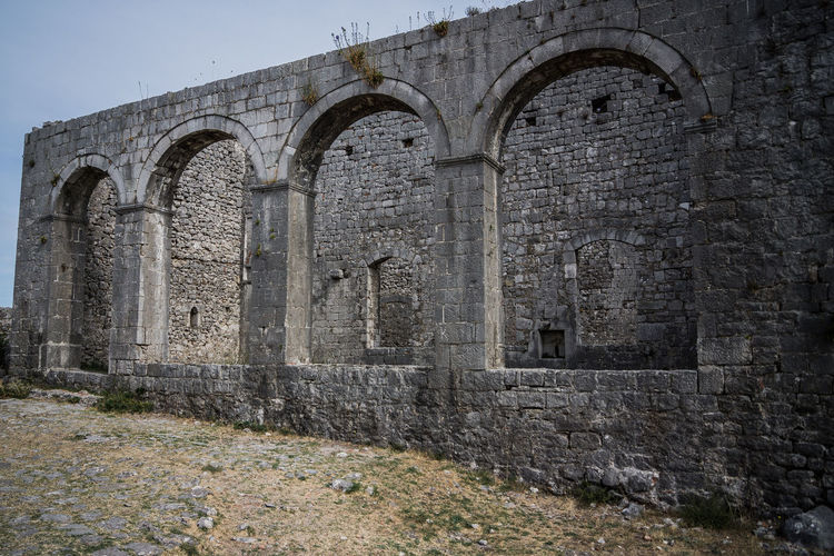 Old abandoned stone wall building