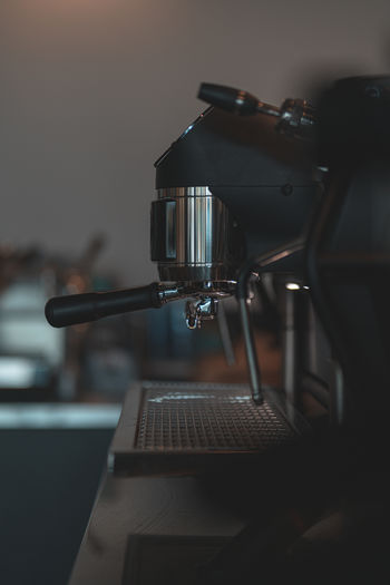 Close-up of espresso machine at cafe