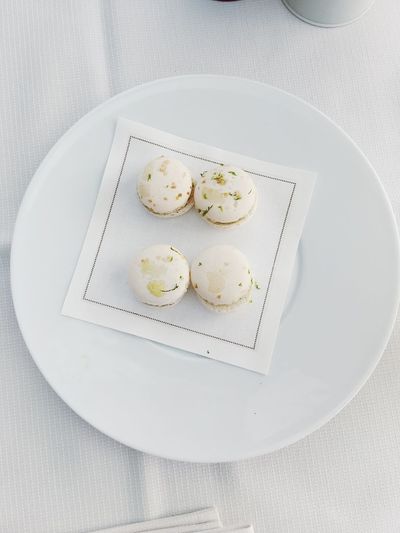 Overhead view of macarons on plate