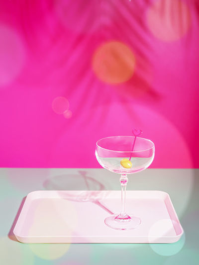 Romantic background with wine glass. summer, holiday, relax composition with empty cocktail glass