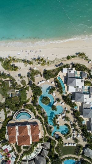 Aerial view of buildings by beach