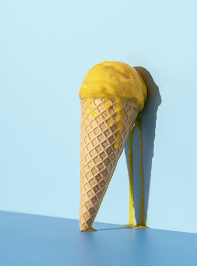 Close-up of ice cream against blue background