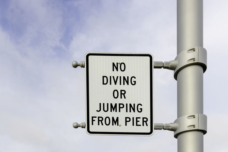 No diving or jumping from pier sign