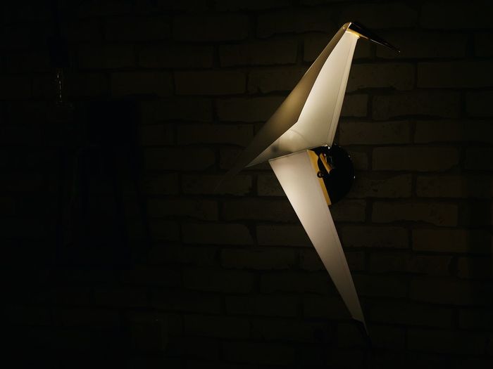 Close-up of lamp against black background