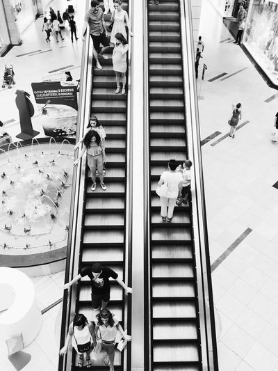 High angle view of people on escalator