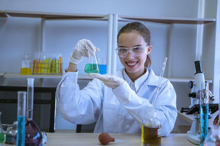 Portrait of smiling woman in laboratory