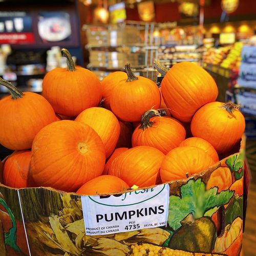 Pumpkins for sale at market stall