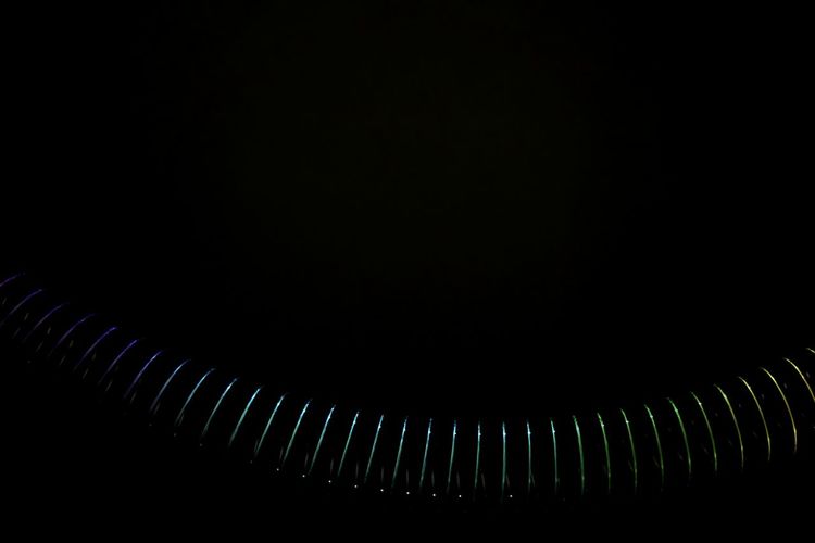 Full frame shot of spiral staircase against black background