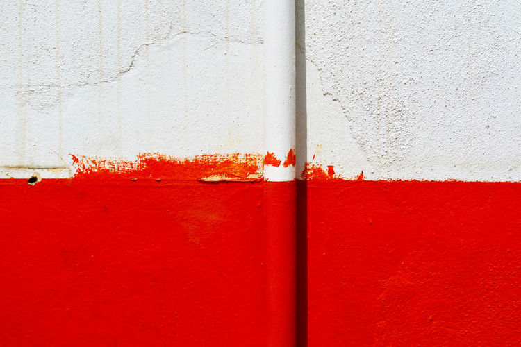 Close-up of red paint on wall