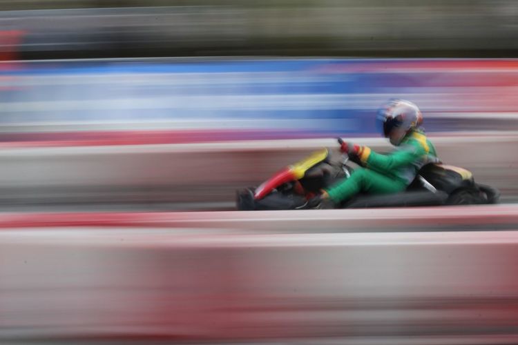 Blurred motion of person during formula one racing