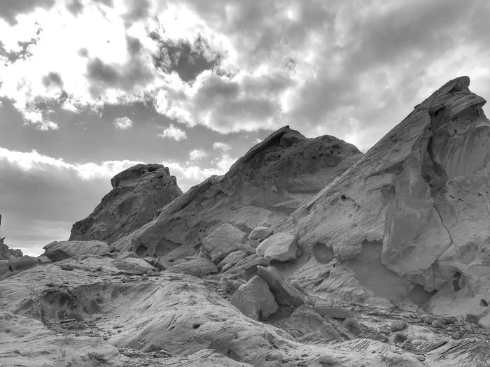 Black and white landscape of three triangular sandstone rock formations