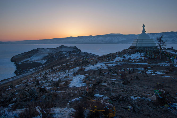 Scenic view of landscape against sky during sunset