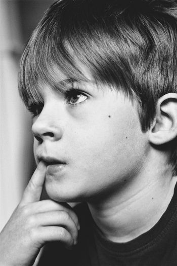 Close-up of child thinking