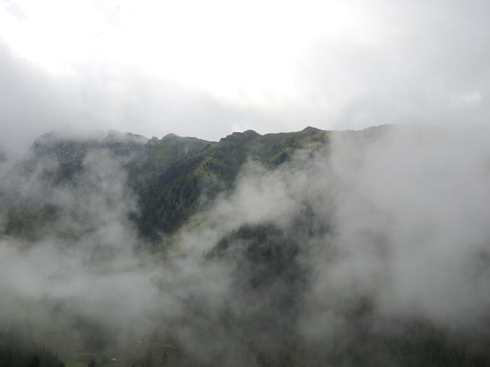 View of mountain range in foggy weather