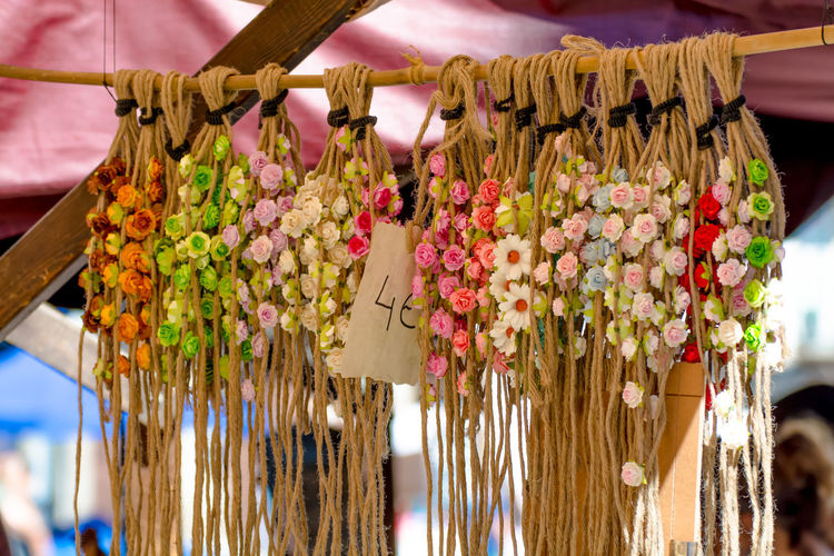 Close-up of hair wreath hanging at market