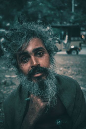 Portrait of bearded beggar