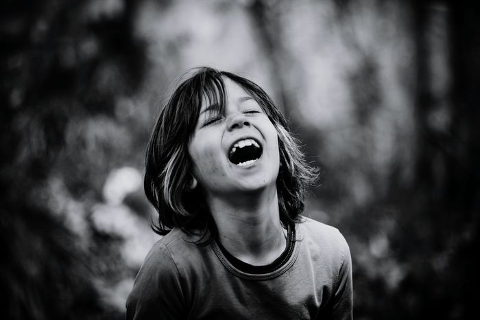 Close-up of boy laughing