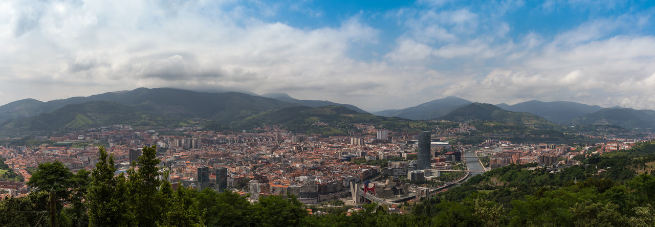 View of the bilbao skyline and nervion river, from etxebarria park