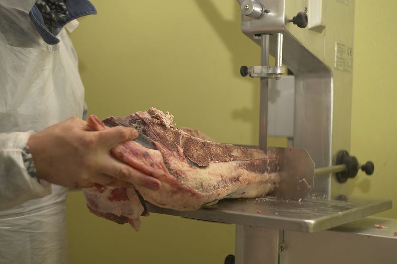 Midsection of man preparing food