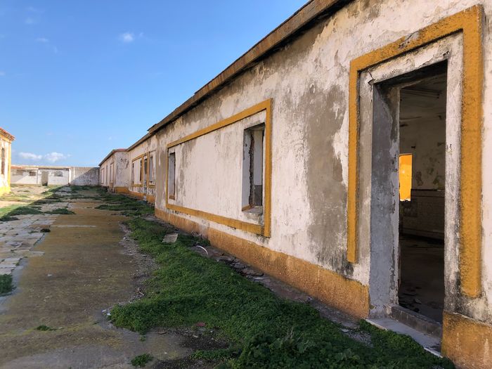 Exterior of old building against sky