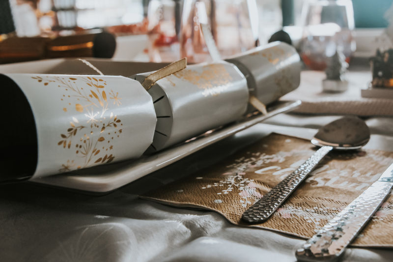 Christmas cracker, table setting at christmas, cutlery, napkin