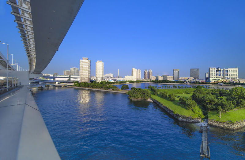 View of the bay of odaiba with daiba park, mall and hotels.