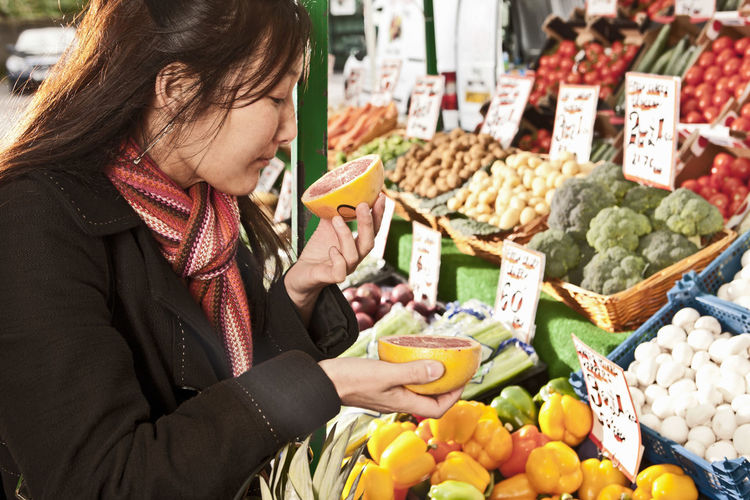 Woman shopping at local produce market