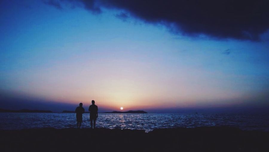 Scenic view of sea at sunset