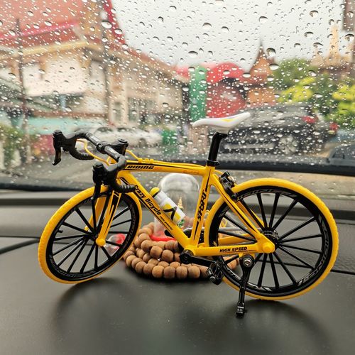 Bicycle on wet street during rainy season