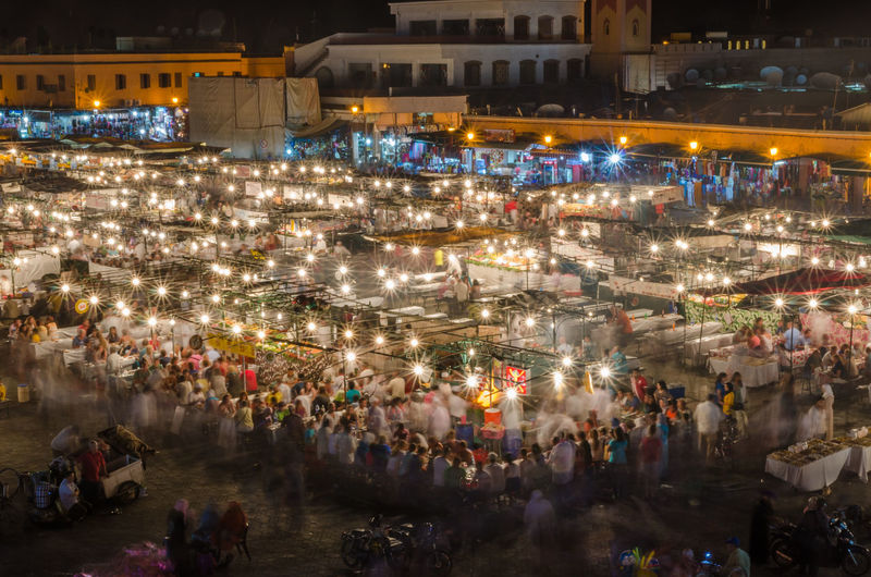 High angle view of people in market at night, djemaa el fna, marrakesh