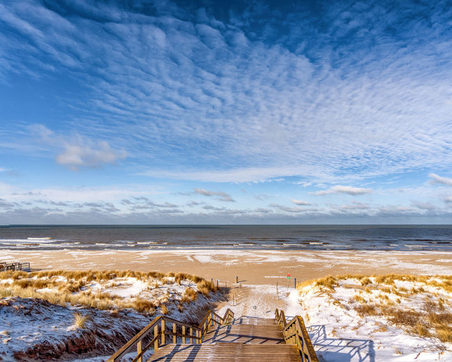 A touch of snow on the beaches of kijkduin in february