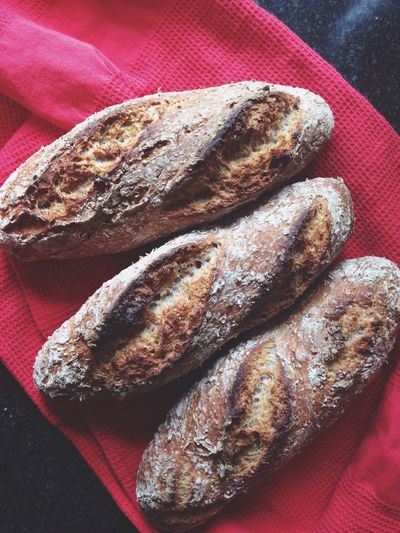 High angle view of homemade french baguettes on napkin