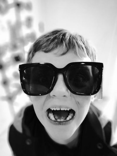 Portrait of smiling boy wearing sunglasses