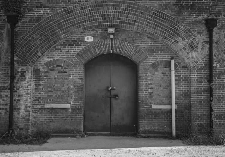 The hilsea lines ramparts fortifications doorway in black and white. 