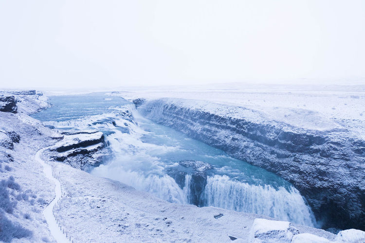 Scenic view of gullfoss falls during winter